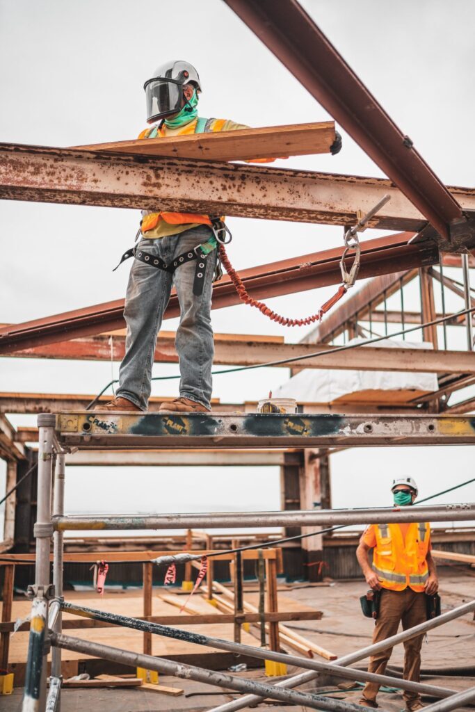 a person standing on a metal structure