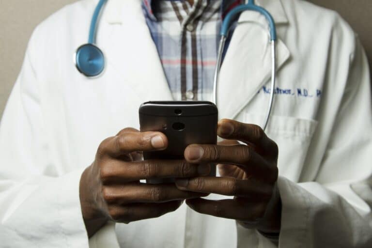 a doctor using a cell phone