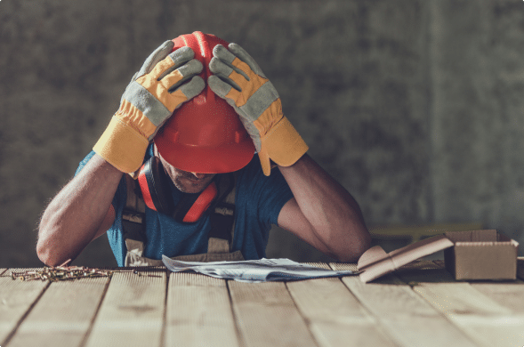 man wearing a hard hat and gloves