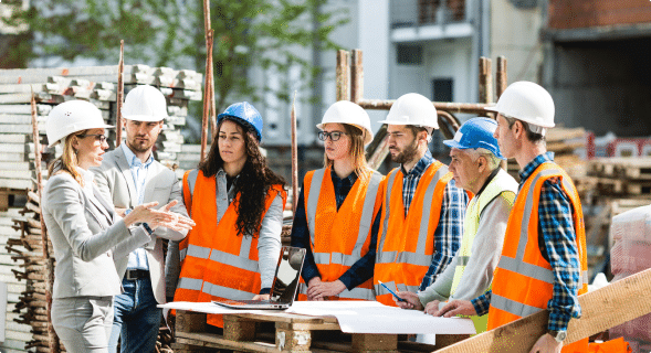 a group of construction safety worker on a site wearing hard hat