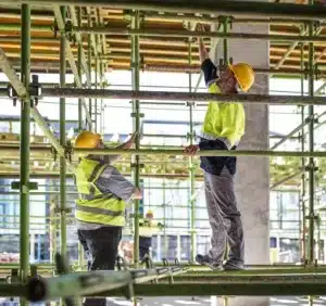 Construction workers on scaffolding